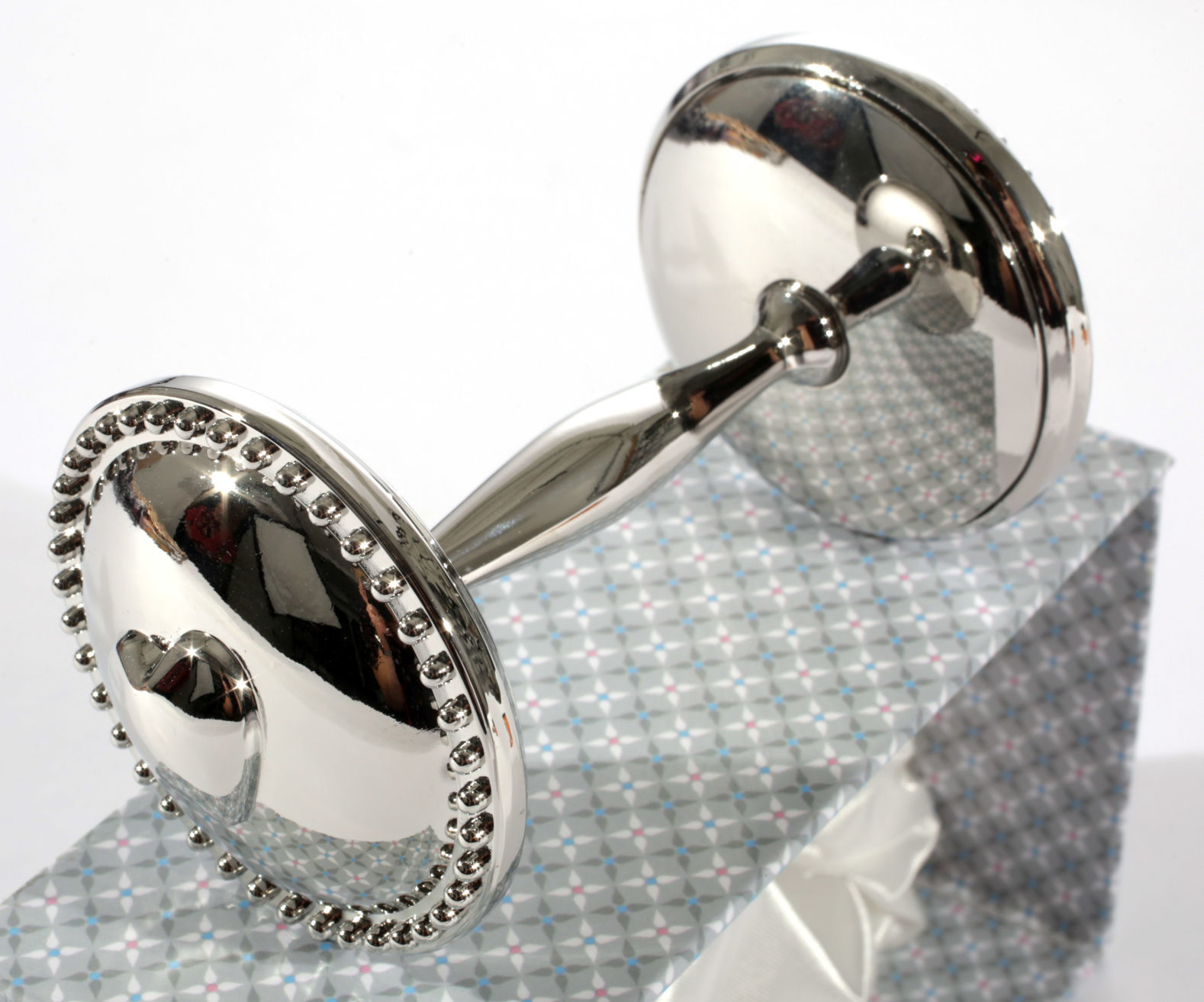 Silver baby rattle